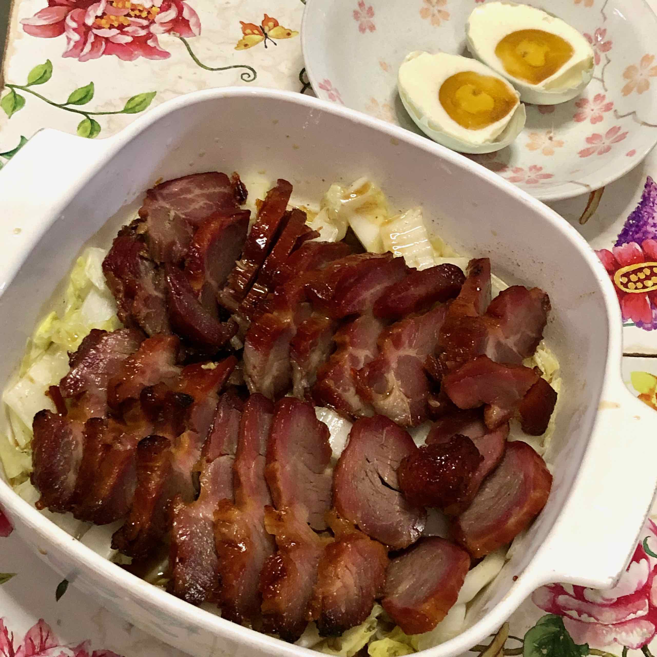 Char siew on a bed of chinese cabbage and salted egg featured image